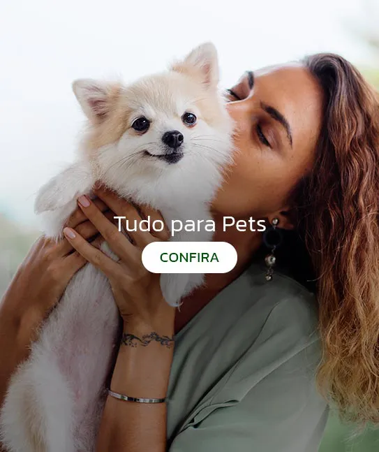 "Banner tudo para pets: mulher segurando cachorro Pomeranian"